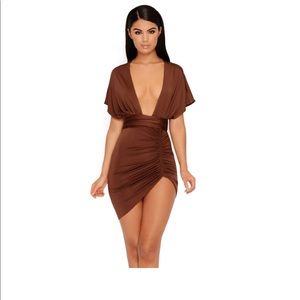 Chocolate dress with plunging neckline.